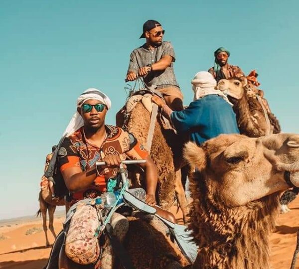 Riding camels and heading to the base camp in Merzouga.